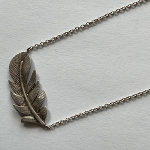 Adornia Silver Feather Necklace. MSRP $75.